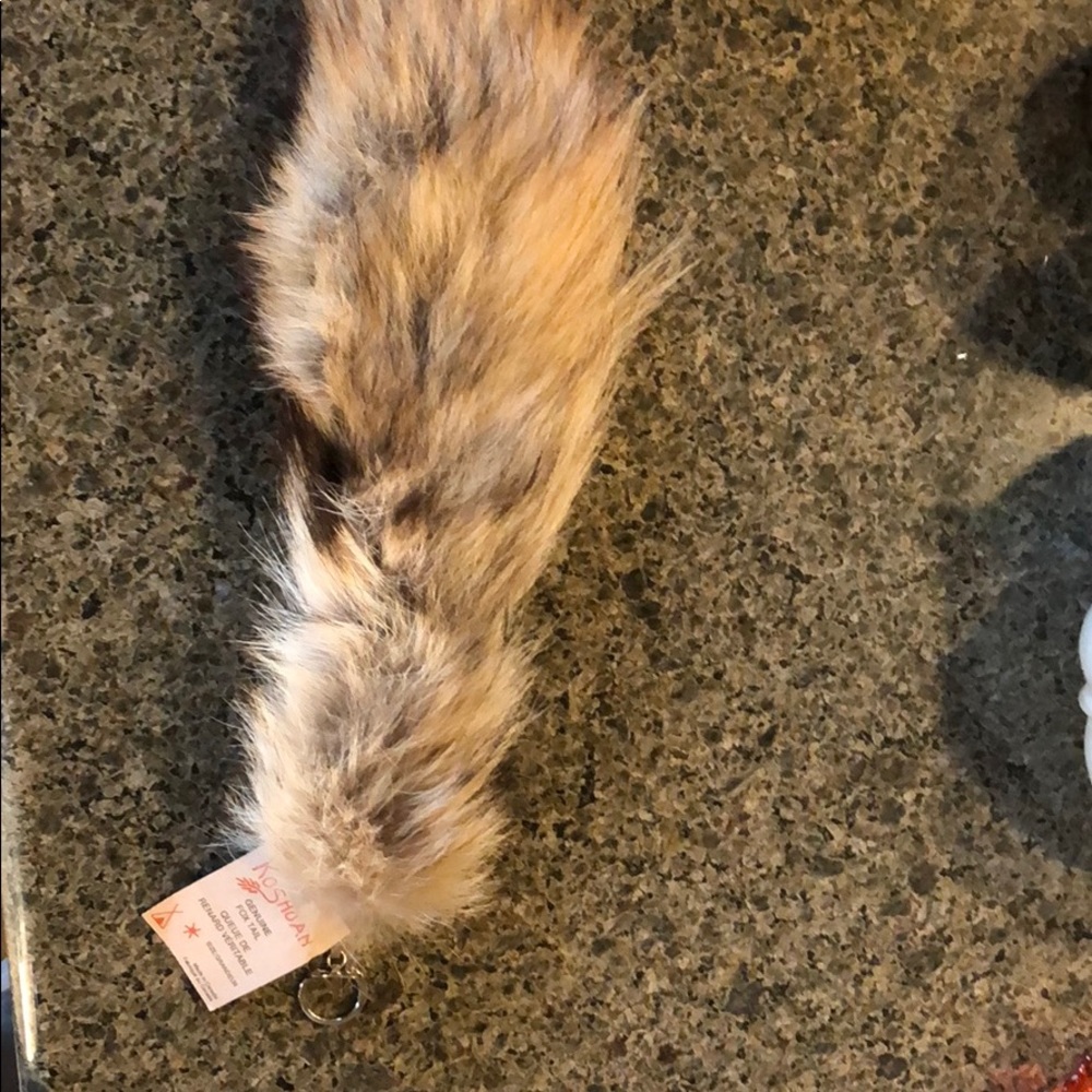 Fox tail fur with key ring. New with tags!